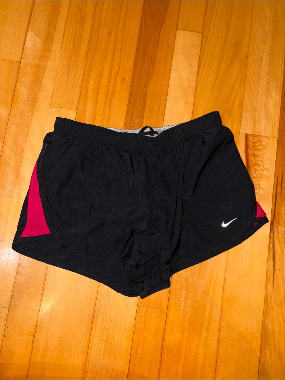 Nike Women's Black Shorts with Pink Side Panels